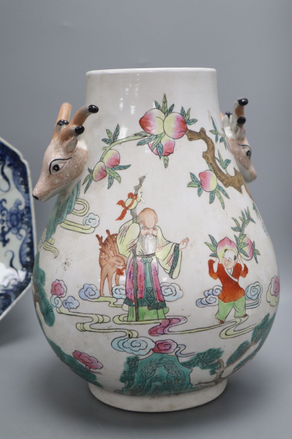 A Chinese vase with deer handles, height 29cm, a Chinese export blue and white plate and a tureen